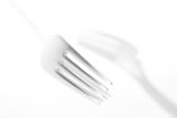 Two forks in white