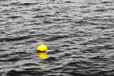 Yellow float in black sea